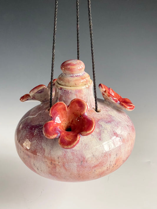 Hummingbird Feeder:  Cream/pink with 3 red flowers