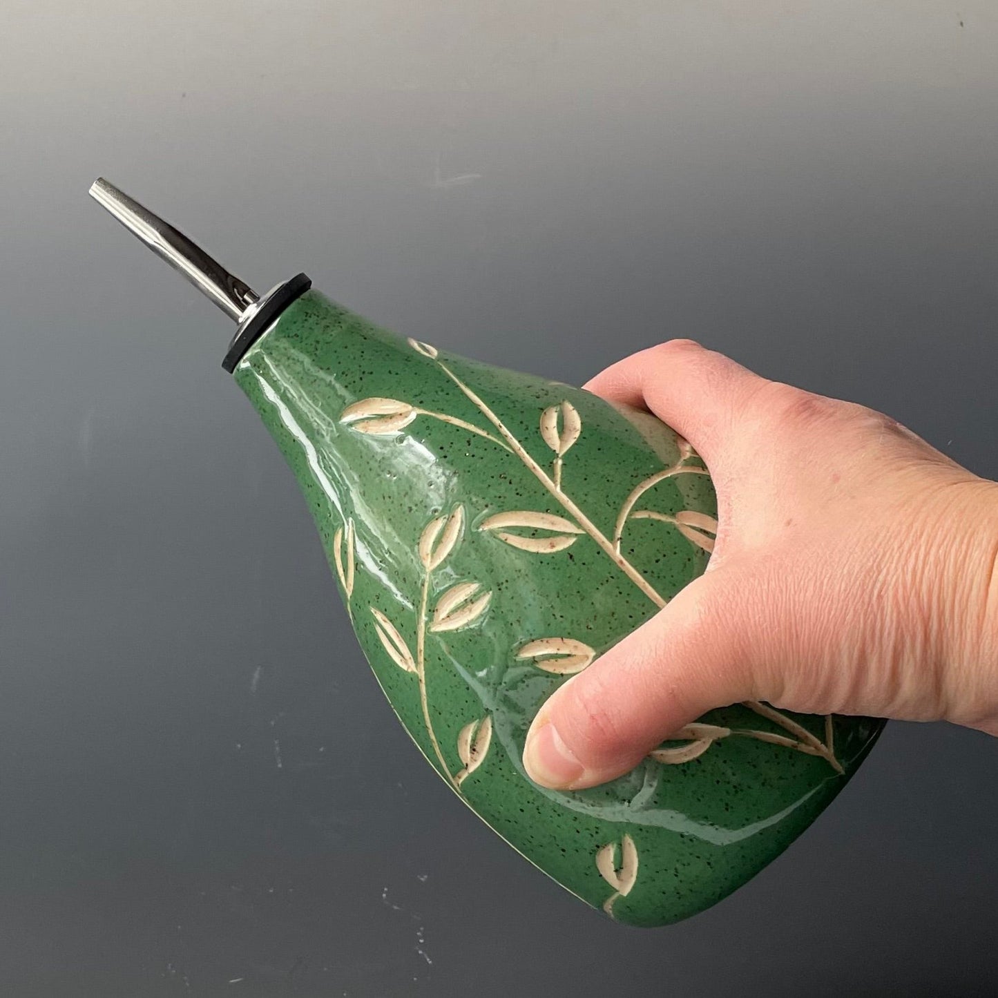 Green Leaf Carved Oil Pourer with thumb indent