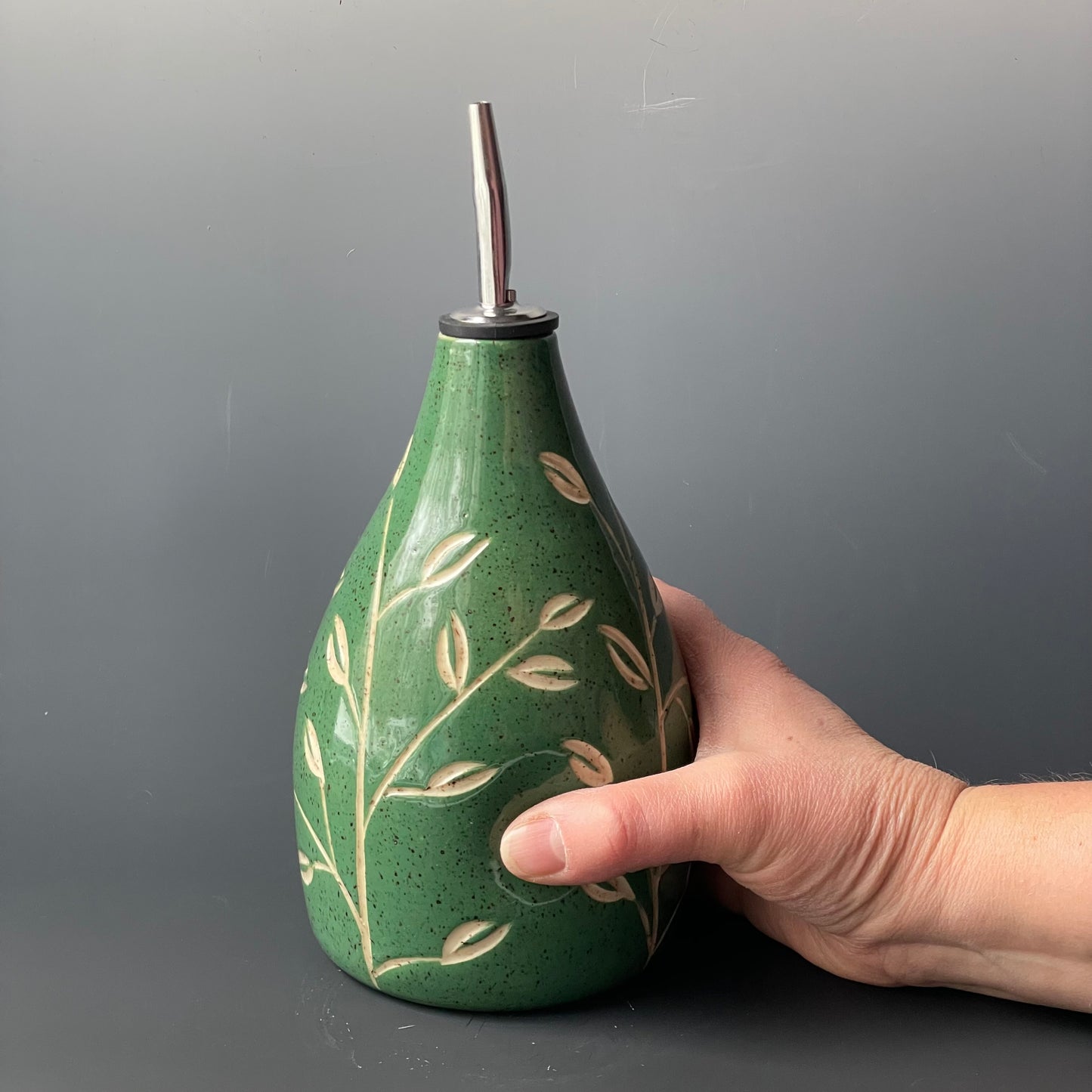 Green Leaf Carved Oil Pourer with thumb indent