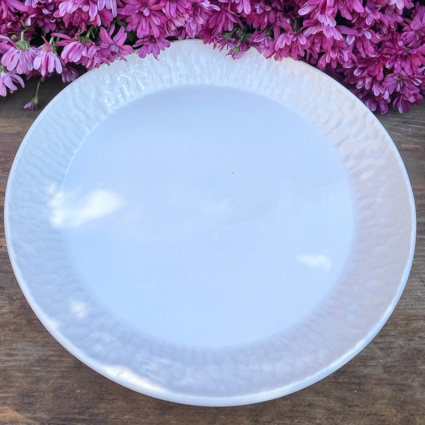 11" White carved porcelain plate