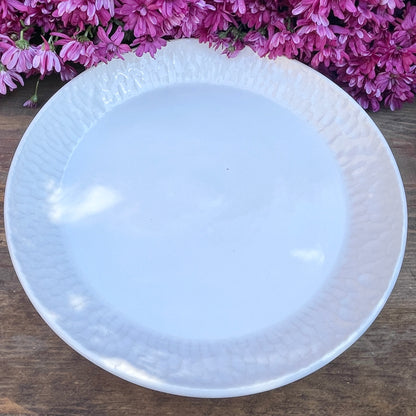 11" White carved porcelain plate