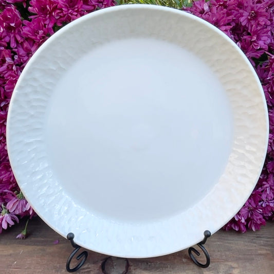 11" White carved porcelain plate
